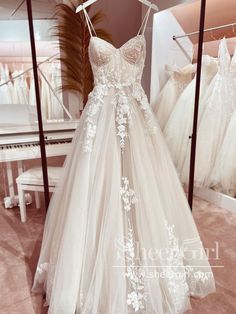 a wedding dress on display in a store