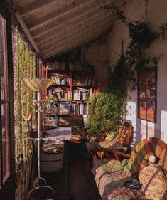 the sun shines through the windows onto a porch with chairs and bookshelves