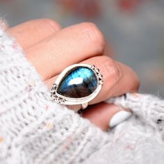 Silver ring with amazing teardrop shape Labradorite gemstone. Amazing iridescent effect with beautiful blue and green colors. Made of solid sterling silver. ❥ Metal: Solid sterling silver ❥ US Ring Size: Choose Size ❥ Width: 25mm ❥ Gemstone: Labradorite ❥ Gemstone Color: Multi-color ✈ Free Shipping (USPS) 🎁 Free Gift Box ↻ 60 Days Return ⌛ 24 Handling Time ** GET 15% OFF COUPON ** Visit 👉 boho-magic.com/join Join and get coupons, exclusive offers, updates, and more surprises! ** ALSO IN OUR SH Ring Teardrop, Full Finger Rings, Southwest Boho, Rings Boho, Unique Silver Rings, Set Rings, Long Ring, Rings Women, Moonstone Ring Sterling Silver