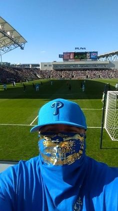 Whats up gangsters, thugs and rabble rousers!! We got a all Royal Blue 100% cotton bandana with ALL GOLD FOIL BLINGING GRILL and Egologics Cholo Script in the corner! It is 22x22 inches and is meant to be folded in half and warn around the face to paralyze anybody in fear they come in contact with. This is perfect for any urban city kid, biker, skater, snowboarder, dubstepper, graffiti writer, breakdancer bboy or anybody that with attitude who knows what time it is. These look totally ill on a m Anonymous Mask, City Kid, Snow Fashion, Skull Mask, Cotton Bandanas, Half Face, Urban City, Green Camo, Snowboarding