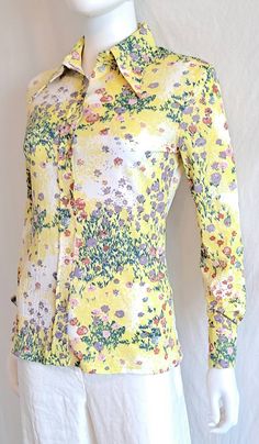 Circa 1970s Charming floral print blouse by Loubella Extendables Pretty soft color palette: pale yellow, lavendar, white, pink and green Button front Large winged collar Made of a nice, drapey polyester Bust 34 Waist 30 Hips 34 Sleeves 23 inch Shoulder seam to seam 15 inch Length from shoulder to hem 24 inch Excellent condition. I see no flaws. Best fit extra small to small Please message me if you have any questions or need additional pictures. Thanks for looking! Multicolor Floral Print Shirt For Daywear, Spring Floral Print Shirt For Daywear, Floral Print Shirt For Spring Daywear, Fitted Multicolor Blouse For Daywear, Feminine Fitted Yellow Blouse, Retro Patterned Shirt For Spring, Fitted Yellow Printed Shirt, Fitted Yellow Printed Blouse, Yellow Printed Collared Blouse