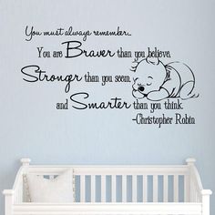 a baby's room with a wall decal that says you must always remember you are braver than you believe