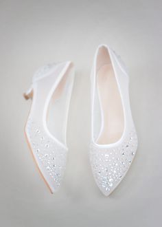 white wedding shoes with sequins on them