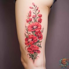 a woman's thigh with red flowers and leaves on the side, in front of her