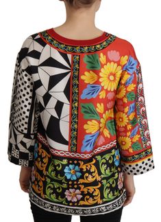 Indulge in the opulence of Italian craftsmanship with this stunning silk blouse by Dolce & Gabbana. This 100% authentic round neck top is adorned with a lavish baroque and floral print, reflecting the brand’s signature aesthetic. A combination of luxury and artistry, it’s a statement piece that’s guaranteed to turn heads. Color: Multicolor Material: 100% Silk Country of origin: IT Made in Italy Logo details Baroque Floral, Round Neck Blouse, Loose Long Sleeve, Round Neck Top, Dolce E Gabbana, Women Sleeve, Round Neck Tops, Dolce & Gabbana, Printed Blouse