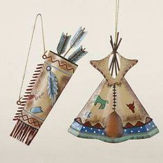 two native american style ornaments hanging from chains