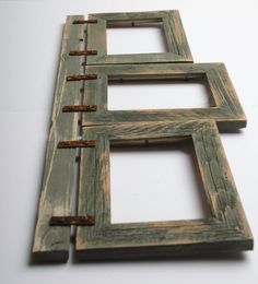 an old wooden ladder is shown with metal straps on the bottom and sides, as well as two pieces of wood that have been cut into smaller sections