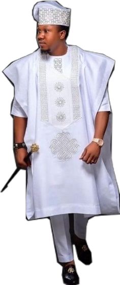 Elegant White Kurta With Traditional Patterns, Elegant Formal Sets With Traditional Patterns, Elegant White Kaftan With Traditional Patterns, Elegant Formal Kurta With Traditional Patterns, Elegant White Agbada For Wedding, Elegant Fitted Ceremonial Thobe, Elegant Fitted Thobe For Traditional Ceremonies, Elegant Fitted Thobe For Ceremonial Occasions, Elegant Fitted Thobe For Ceremonial Events