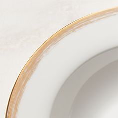 Coveted for its bright white hue and translucence, fine bone china soup bowl has a timeless appeal. Reinterpreted for modern entertaining and fine dining, the elegant bowl features a delicate hand-painted gold rim. Part of the Isa dinnerware collection. CB2 exclusive.  -Fine bone china -Hand-painted gold rim -Hand-wash only -Imported Isa White Fine Bone China Soup Bowl White Pasta Bowls, White Soup, White Dinnerware Set, White Pasta, White Dinnerware, White Dinner Plates, Pasta Bowls, White Coffee Mugs, White Coffee