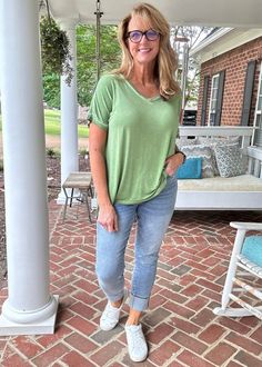 This unique top features a washed design, short raglan sleeves, roomy fit, and a hi-low hem for a chic look. Each item may vary slightly in color and finishing, adding to its individuality. With a total body length of 26.5" (front) and a chest measurement of 42" (approx.), this top is crafted from 95% rayon and 5% spandex. Kim is 5'9" & is wearing a size XL. Offered by Jimberly's Boutique, your go to for Zenana Casual Tops. Find the perfect jeans and shoes to compliment this top. Charles River Rain Jacket, Jeans And Shoes, Menswear Women, The Perfect Jeans, Unique Top, Chic Look, Judy Blue Jeans, Perfect Jeans, Outfit Goals