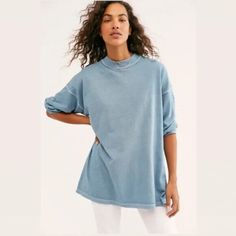 Elevate Your Wardrobe With This Stylish Free People Mock Neck T-Shirt In Blue. This Versatile Piece Features Long Sleeves And A Solid Pattern, Making It Perfect For Any Occasion. The Shirt Is Made From High-Quality Materials And Designed With A Regular Size Type For A Comfortable Fit. The Mock Neck Adds A Touch Of Sophistication To The Basic Style, And The Xs Size Ensures A Flattering Fit For Petite Frames. Whether You're Dressing Up For A Night Out Or Keeping It Casual, This Free People T-Shirt Trendy Blue T-shirt For Fall, Blue T-shirt For Everyday Fall Wear, Relaxed Soft-washed Top With Shirttail Hem, Washed Blue Everyday Top For Fall, Washed Blue Top For Everyday Fall Wear, Light Wash Oversized Tops For Everyday, Everyday Washed Blue Top For Fall, Oversized Light Wash Tops For Everyday, Blue Crew Neck Top For Fall