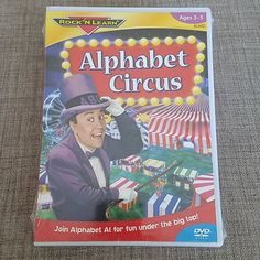 the dvd cover for alphabet circus with an image of a man wearing a top hat