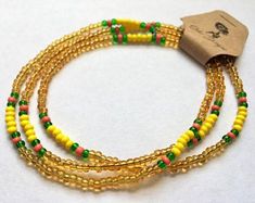 Olokun Santeria Elekes Collares de Santo Lucumi Yoruba Iyawo | Etsy Handmade Yellow Beads For Gift, Yellow Bohemian Necklace With 108 Beads, Green Beach Jewelry With 108 Beads, Unique Yellow Necklaces For Beach, Handmade Yellow Beaded Necklaces For Festivals, Yellow Necklace With 108 Beads As Gift, Handmade Yellow Necklaces For Festivals, Yellow Beaded Necklaces For Festivals And Gifts, Yellow Beaded Necklaces For Gifts At Festivals