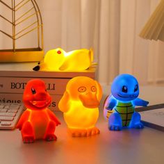 This Pokemon Night Light is a finely crafted, finished model made from durable ABS material. It features a charming Pikachu design that appeals to all genders and ages. The compact dimensions of 7*12cm make it a perfect addition to any space. No remote control is needed, and the light operates on button batteries, which are included for your convenience. With the CE certification, you can trust the safety and quality of this product. Whether you're a fan or looking for a delightful gift, the Pok Pokemon Room Ideas Kids, Pokemon Bedroom Ideas, Pokemon Night, Pokemon Night Light, Pokemon Room, Bedroom Lamp, Doll Home, Color Box, Led Night Light