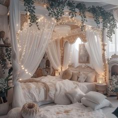 a bed with white curtains and lights on it