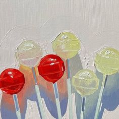 some red and yellow lollipops on a white background