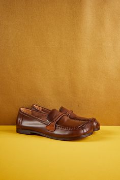 Introducing Rumour Has It's Serious Leisure Leather Loafer in classic brown. Crafted with premium leather, this loafer combines style and comfort for a truly versatile shoe. Whether you're dressing up for a formal event or keeping it casual, this loafer will elevate any look with its sleek design and all-day comfort. 0.98" heel Pull-on Leather upper Leather lining Leather footbed Rubber sole Slip-on Brogue Detailed Closed Toe Moccasins, Slip-on Brogue-detailed Closed Toe Moccasins, Slip-on Brogue Moccasins With Closed Toe, Leather Slip-ons With Brogue Detailing And Flat Heel, Slip-on Closed Toe Moccasins With Brogue Detailing, Brown Slip-on Tassel Loafers With Closed Toe, Brown Tassel Loafers With Leather Footbed, Brown Leather Almond Toe Slip-ons, Brown Tassel Loafers With Brogue Detailing