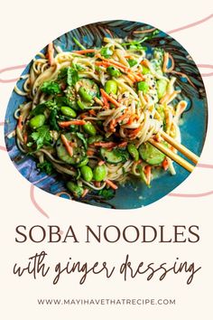 a blue plate topped with noodles and veggies next to chopsticks on a table