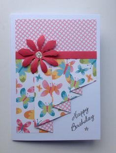 a close up of a birthday card with flowers on the front and back side,