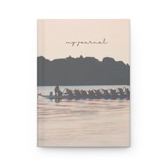 a book cover with a row boat on the water and mountains in the background that reads, my personal