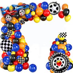 the letter c made out of balloons and race cars is shown in front of a white background