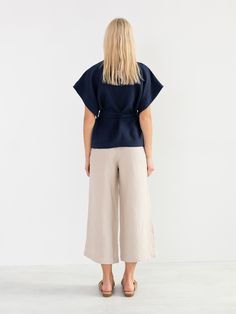 "ELI is a short sleeve linen kimono jacket. DETAILS - Kimono style - Self tie belt - Short sleeve - 100% lightweight European linen fabric - Cut and sewn to order just for you in our studio COLOR - Navy Blue, you can also choose other colors above - Fabric samples are available here https://www.etsy.com/listing/586569696/linen-fabric-samples SIZING & FIT - Relaxed fit - Length (shoulder to hem) is approximately 26 inches / 66 cm - Bust (pit to pit) is approximately 25.5 inches / 65 cm - Slee Chic Kimono Sleeve Tops For Work, Chic Workwear Tops With Kimono Sleeves, Chic Workwear Kimono With Kimono Sleeves, Chic Kimono With Kimono Sleeves For Work, Spring Workwear Kimono With Kimono Sleeves, Spring Workwear Kimono, Gray Kimono, Kimono Wrap Top, Linen Camisole