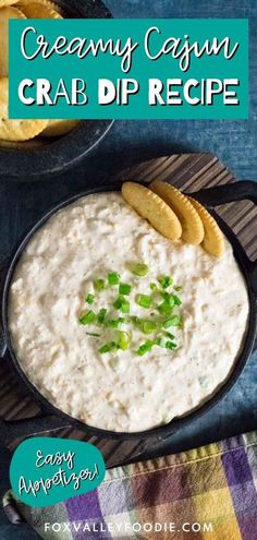 creamy cajun crab dip recipe in a cast iron skillet with crackers