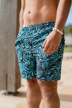 These swim trunks have everything you need for a hot summer day—they’re quick-drying and breathable, have multiple pockets for your belongings, and feature a silky, anti-chafe inner liner. Get yours now! • Fabric composition: 91% recycled polyester, 9% spandex • Liner composition: 92% polyester, 8% spandex • Four-way stretch water-repellent microfiber fabric • Anti-chafe mesh inner liner • Elastic waistband with drawcord • Mesh pockets • Small inside pocket for valuables • UPF 50+ Anti Chafing, Couple Matching, Shorts For Men, Swim Suit Bottoms, First Nations, Summer Day, Swimsuit Tops, Swim Trunks, Hot Summer