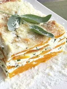 some food is sitting on a white plate and has green leafy garnish