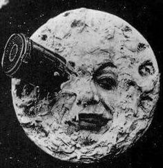 an image of a moon with a telescope in it's mouth and the face of a man