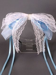 This KC piece features a butterfly-shaped design with lace accents, embellished with ribbons and available in both white and blue color options.   The price is for a KC only, others are not included. Blue Party Bow With Ribbon, Blue Ribbon Bow For Party, Blue Bow With Butterfly Knot For Wedding, Blue Wedding Bow With Butterfly Knot, Adjustable Blue Bow With Ribbon, Adjustable Blue Ribbon Bow, Blue Ribbon Bow, Steampunk Fashion Male, Gothic Skirts