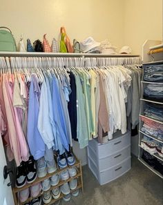 a closet filled with lots of clothes and shoes