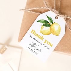 a brown envelope with a thank you tag attached to it