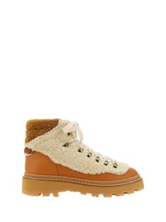 Calfskin peka trek ankle boots by moncler, shearling detailing, lace-up front closure, vibram rubber non-slip sole. Composition: 100% % Rubber, 100% % Calf Leather Bos Taurus Moncler Boots, Moncler Women, Italian Luxury Brands, Expensive Handbags, Margiela Shoes, Stella Mccartney Bag, Brown Ankle Boots, Rubber Boots, Louis Vuitton Shoulder Bag