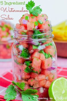 watermelon salsa in a mason jar with cilantro and lime