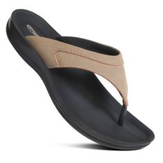 Step into everyday elegance with these cushioned flat sandals for women. Featuring a synthetic leather upper and stylish stitching, they boast a chic design that effortlessly enhances your ensemble. Enjoy lasting comfort with the cushioned strap and secure toe post, ensuring each step is cushioned and stable. Whether you're running errands or meeting friends for lunch, these sandals provide the perfect blend of style and comfort. Elevate your casual look effortlessly with their versatile appeal Comfortable Toe Post Sandals With Ortholite Insole, Comfortable Leather Footbed Flat Flip Flops, Comfortable Leather Flat Flip Flops, Leather Flat Sport Sandals With Arch Support, Flat Sandals For Women, Everyday Elegance, Meeting Friends, Sandals For Women, Chic Design