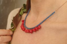 This statement necklace has natural red sandal wood seeds, we designed this earthy jewelry with blue coco beads and beige silk cord.  Our ecofriendly necklace is adjustable, it can be used as both long and choker necklace.  It can be as long as 25 inches (65cm) and it will be as short as a choker.  We make all of our jewelry using ecofriendly materials, we collect them from sea shores and forests. When we should buy anything, we carefully select fair trade raw materials.  Details:   -It can be a Seed Jewelry Natural, Red Fair Trade Beaded Necklace As Gift, Red Fair Trade Necklace As Gift, Fair Trade Natural Beaded Necklaces As Gift, Fair Trade Natural Beaded Necklace For Gift, Fair Trade Natural Beaded Necklace Gift, Earthy Necklace, Seed Necklace, Lover Necklace