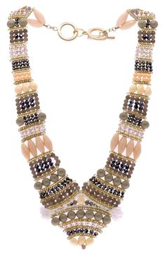 A cluster of beads in intriguing designs elevates this layered necklace for a fashionable look. Goldtone plate/glass Imported Beige Multi-strand Beaded Jewelry, Beige Beaded Necklaces For Parties, Beige Beaded Necklace For Party, Party Beaded Beige Necklaces, Party Beaded Beige Necklace, Women's Necklace, Glam Party, Gold Statement Necklace, Beaded Statement Necklace