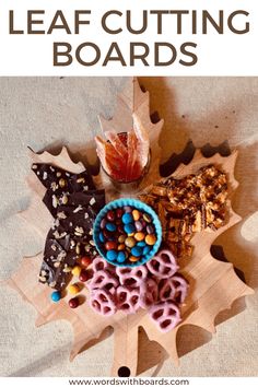 fall leaf cutting boards with candy, pretzels and candies on them for kids to make