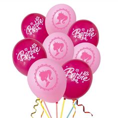 a bunch of pink balloons with the words barbie on them