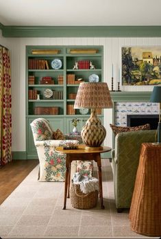 a living room filled with furniture and bookshelves