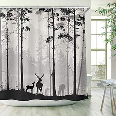 a shower curtain with deer in the woods