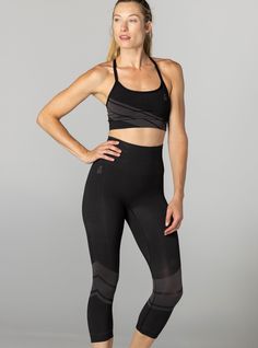 Our BDlab Capri is a seamless, light-compression 3/4 length tight. Great for yoga, barre, fitness classes, spin classes, running and gym workouts. Engineered using sculpting seamless technology, technical premium yarns + extremely high-grade fabrics. Body mapping garments that sculpt and shape. The result—modern performance apparel with light compression that is supportive, not restrictive. 70% polyester / 30% lycra Ultra high waist that can be rolled down to hip level revealing “Bad Ass Is Beau Black Capri-length Activewear For Sports, High-cut Compression Leggings For Yoga, Compression Capri-length Bottoms For Yoga, Black Fitted Capri-length Activewear, Compression Leggings With 5-inch Inseam For Yoga, Body Map, Spin Class, Performance Outfit, Mid Calf