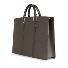 Crafted in deep brown taiga leather, this briefcase from Louis Vuitton is an absolute must-have for anyone who insists on only going to work in the most stylish way possible. This piece is minimal yet practical as its sturdy structure will keep your laptop and papers safe on the go. SPL Exterior Deep brown taiga leather Silver tone hardware Zip closure "N.O" initials on front Two brown top handles Detachable shoulder strap Front LV logo in right corner Excellent condition - some rubbing to the corners but clean overall Interior Brown leather interior Large pocket at front and back Two slip pockets Louis Vuitton embossed logo D ring for keys Good condition - some markings and scratches inside from general use tuffing purposes SPL Height 31cm Width 42cm Depth 10cm Logo D, Lv Logo, Brown Top, Deep Brown, Dior Shoes, Brown Canvas, Leather Silver, Embossed Logo, Chanel Handbags