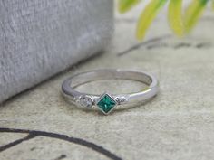 "Emerald Engagement Ring, Bezel Set Princess Cut Bridal Ring, Brithstone Ring, Gemstone Ring, Multi stone Silver Ring, Green Stone Rings,  𝐈𝐭𝐞𝐦 𝐃𝐞𝐬𝐜𝐫𝐢𝐩𝐭𝐢𝐨𝐧 Metal :  925 Sterling Silver Plating: White Rhodium Plating Setting : Bezel Set Ring Type: Art Deco Ring ❁ Stone Details ✶ Stone Shape : Princess & Round Cut ✶ Stone Type :  Cubic Zirconia  ✶ Carat Weight : 0.15 Ct ✶ Color : Green ( Eye Clean) & D/White ✶ Clarity : VVS1 ❁ Total Carat weight: 0.15 Ctw+- ❁ Gemstone Option As Per Image:  Blue Garnet Ruby   Yellow Black  White Amethyst Green Peridot Aquamarine ❁ Policies & Note ❁  ● Don't forget to read our store policies before placing your order for critical information on turnaround times, delivery methods, and returns. ● Any metal weights, totals, and stone weights/measur Fine Jewelry Birthstone Ring With Stone Setting For Anniversary, Wedding Crystal Ring With Bezel Setting For May, Wedding Crystal Ring With Bezel Setting For May Birthstone, Fine Jewelry Birthstone Ring For Anniversary, Silver Emerald Ring With Bezel Setting For Wedding, May Birthstone Crystal Ring With Bezel Setting For Anniversary, Emerald Engagement Ring Bezel, Engagement Ring Bezel, Ring Green Stone