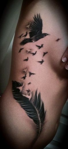 a woman's stomach with birds on it