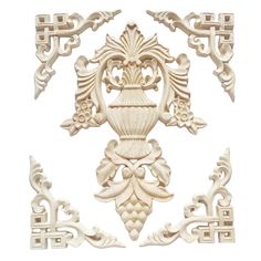 an intricately carved wall panel in white wood