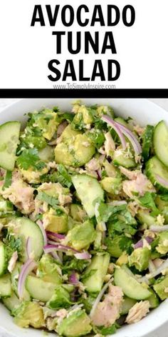 a salad with cucumbers, onions and avocado is shown in a white bowl