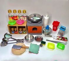 an assortment of kitchen utensils and cooking supplies