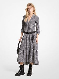 A lightweight cotton-silk fabric gives this dress a diaphanous feel with every step. Designed with a deep V-neckline, point collar and A-line silhouette, it features a full tiered skirt and a quietly edgy leopard print. Accentuate your waist with a low slung belt. Cotton Silk Fabric, Denim Shoulder Bags, Grey Midi Dress, Frayed Denim, Tiered Midi Dress, Michael Kors Collection, Tiered Skirt, Gray Dress, Cotton Silk